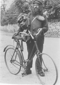 A person riding on the back of a bicycle
