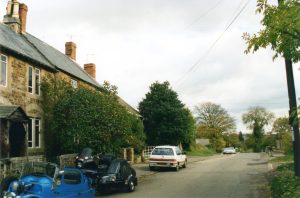 A car parked on the side of a road