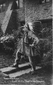 A person standing in front of a building