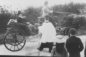 A group of people in an old photo of a person