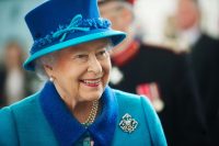 Elizabeth II wearing a blue hat