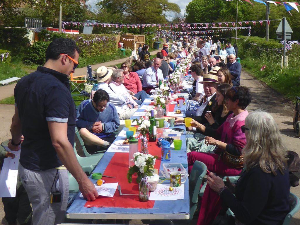 A group of people standing in front of a crowd
