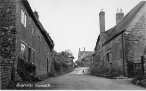 A vintage photo of an old brick building