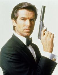 Pierce Brosnan wearing a suit and tie