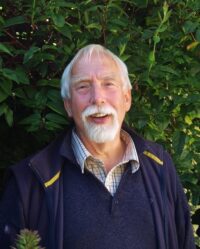 A man wearing a suit and tie