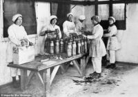 A group of people are cooking in an old photo of a person
