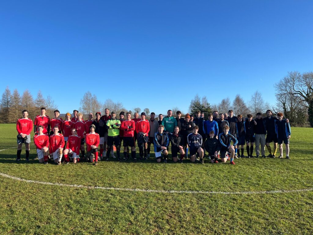 A group of people standing in a field